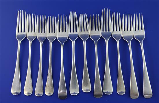 A harlequin set of twelve 19th century silver dessert forks, 14.5 oz.